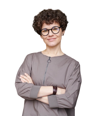 Headshot of a curly-haired woman wearing glasses, smiling with arms crossed.