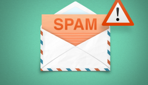 Envelope with "SPAM" written on it and a warning sign, representing email spam.