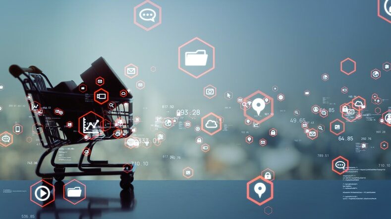 Shopping cart surrounded by digital icons, symbolizing e-commerce or online shopping.
